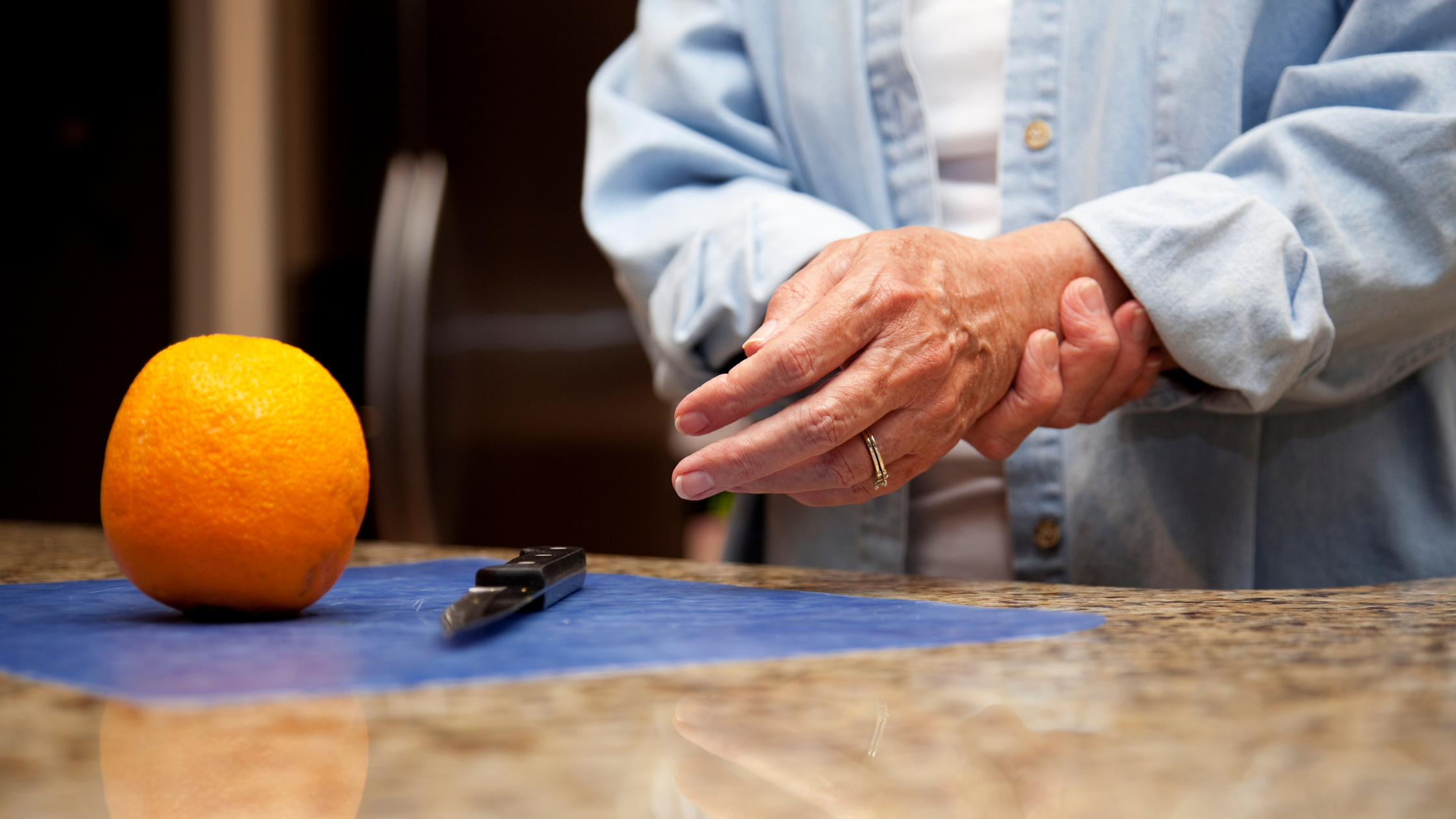 man with arthritis pain in wrist